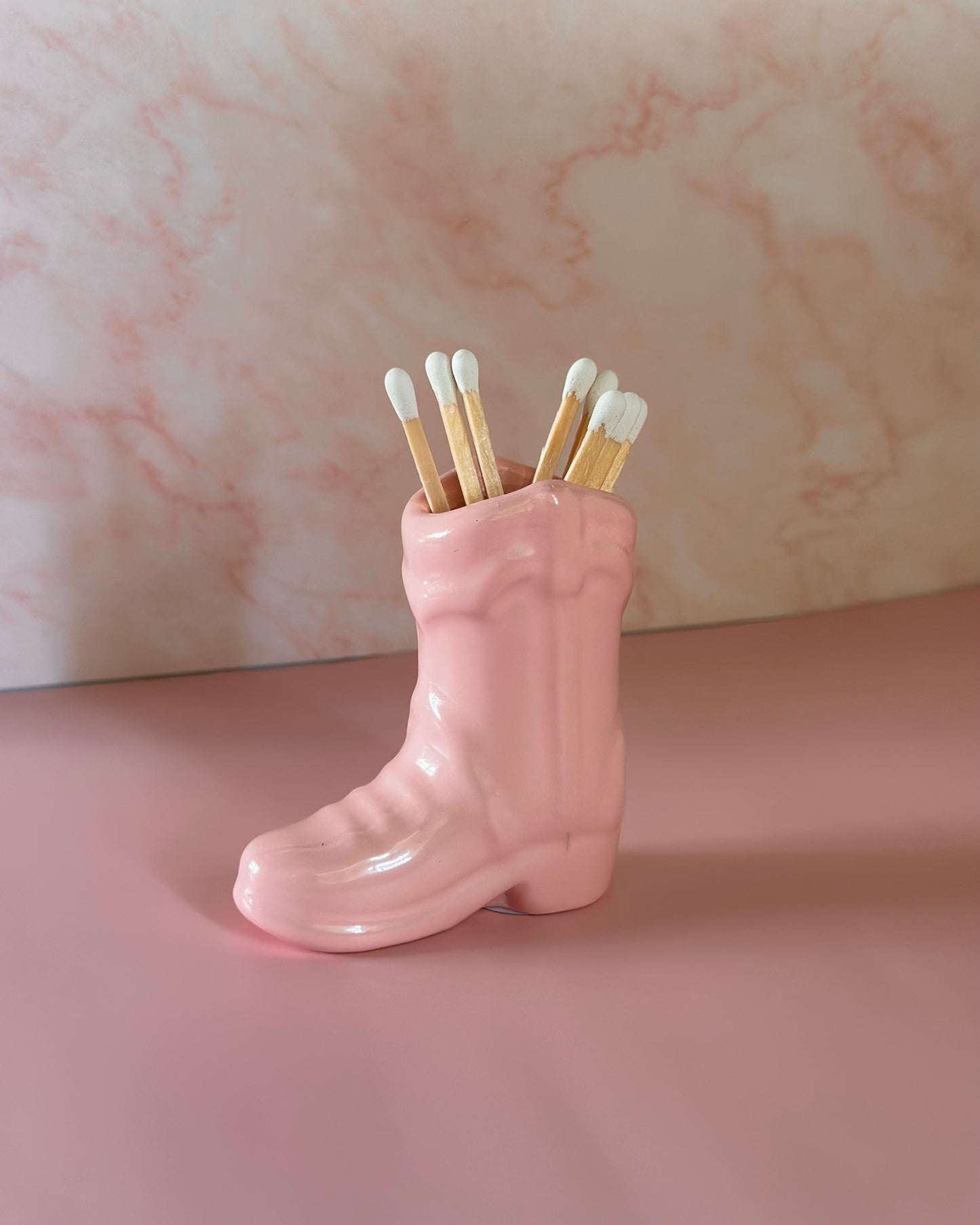 Porta-fósforos para botas