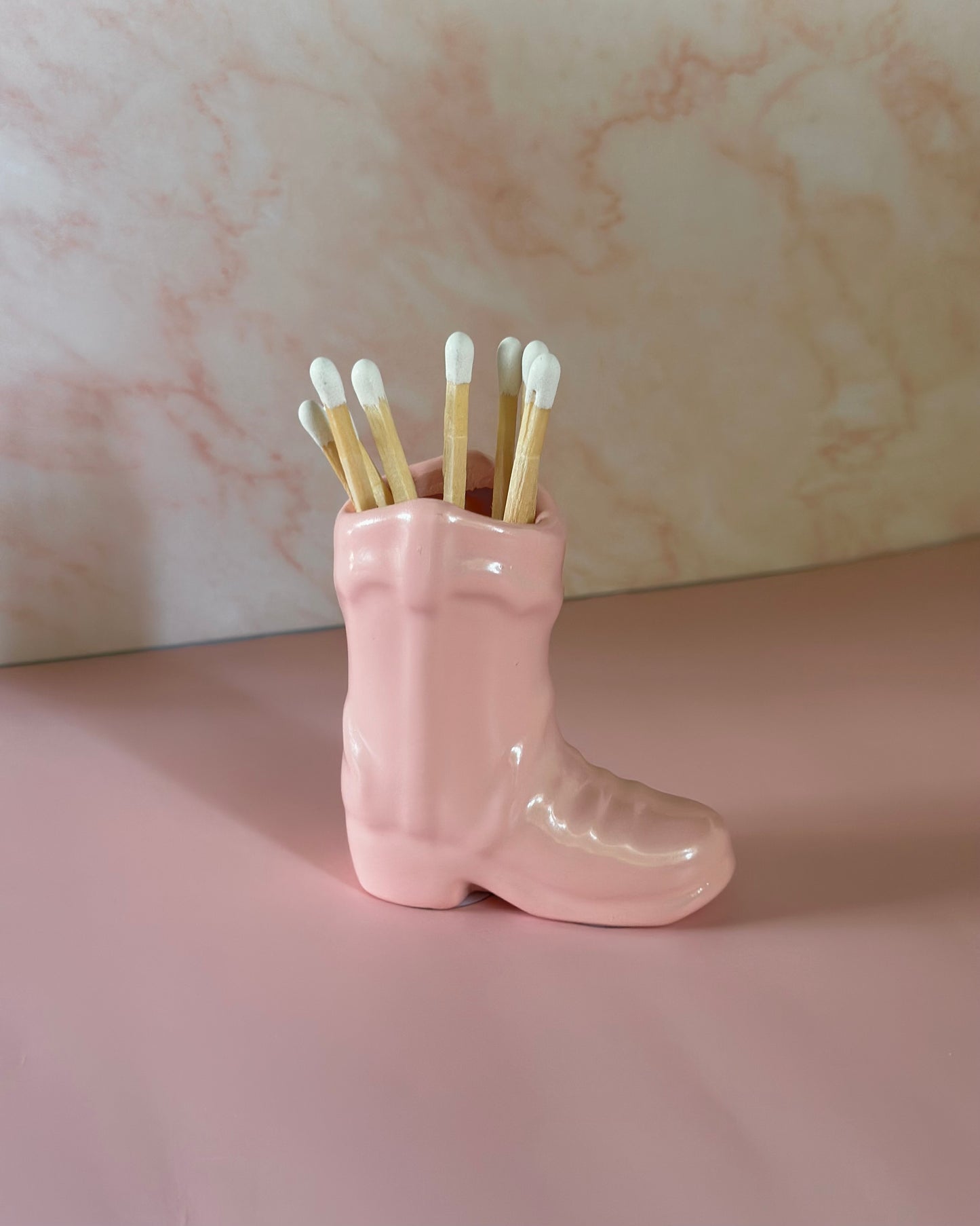 Porta-fósforos para botas